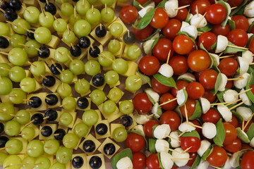 Party skewers with tomatos cheese and grapes