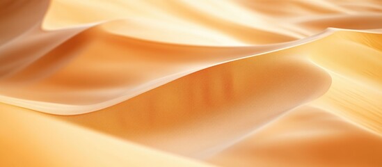 Obraz premium Close up orange sand texture in Empty Quarter Desert in United Arab Emirates. Sand dunes. Abstract sand texture