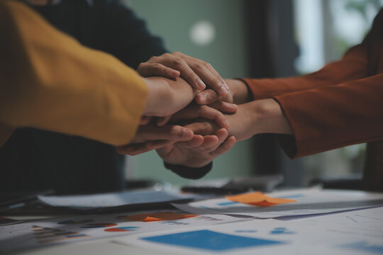 Hand join together for work togetherness, Hand stack for business and service, Team volunteering or teamwork. Concept connection of community and charity. Group of business workforce participation.