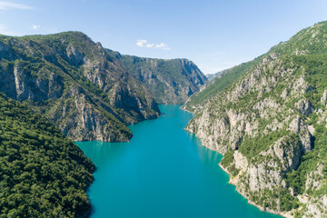 Aerial view of famous Piva Canyon with its fantastic reservoir