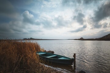Boat at lake with overcast weather