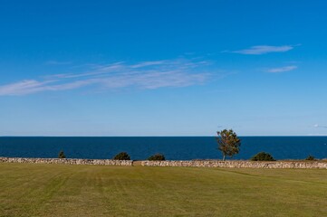 Minimalistic Path Landscape of Stones wall line on Panga cliffs , Saaremma. Estonia