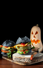 Burgers with black bread, Halloween style, day of the dead.