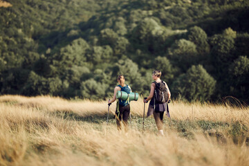 Two Women Hiking On Mountain