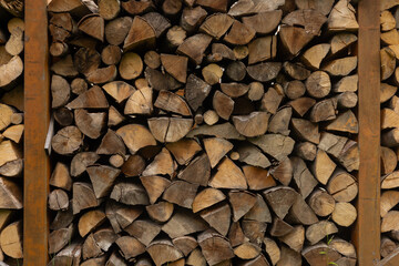 Large pile of chopped firewood