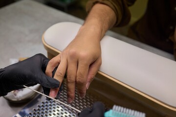 Get an exquisite professional nail art procedure in a modern salon setting filled with elegance