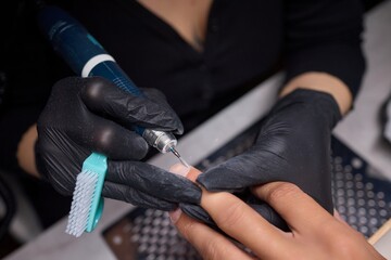 Get an exquisite professional nail art procedure in a modern salon setting filled with elegance