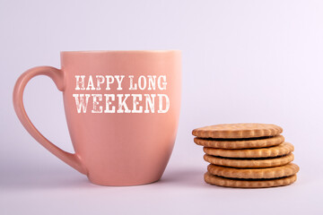 Happy Long Weekend. Motivational text on a coffee mug