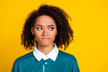 Photo of adorable stunned woman with perming coiffure dressed stylish shirt staring pouted lips...