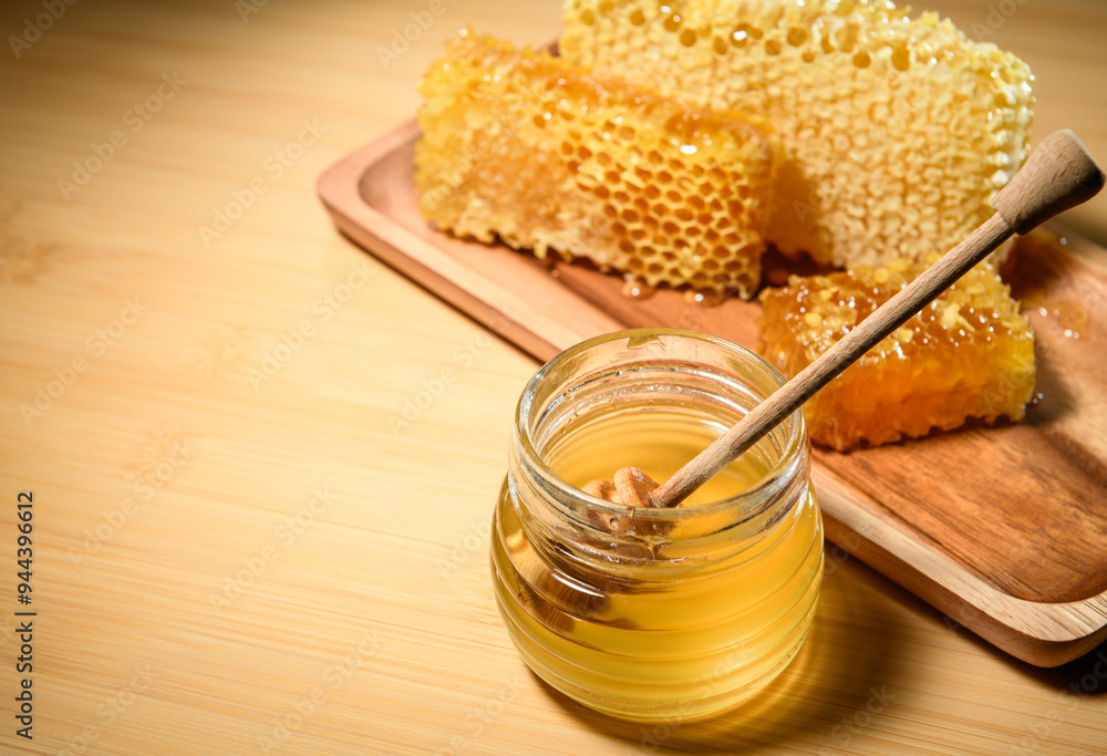 Wall mural natural golden honey with honeycombs