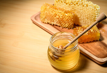 Natural golden honey with honeycombs