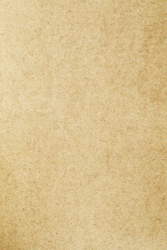 Macro grains kraft brown paper with scratches texture