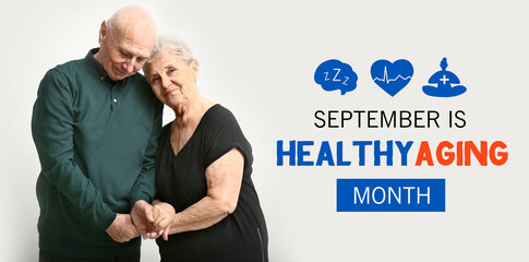 Portrait of senior couple on white background