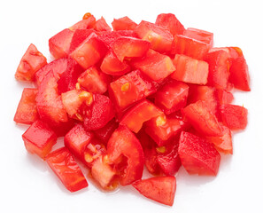 Peeled and diced tomatoes isolated on white background. Macro shot.