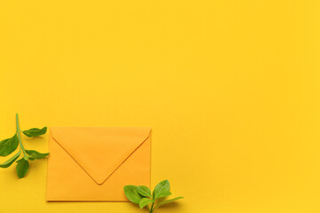 Paper envelope with plant branches on yellow branches