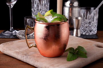 Moscow mule with bar equipment background.
