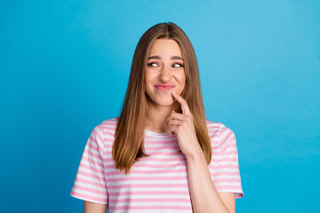 Photo of adorable lovely dissatisfied woman wear stylish clothes look empty space hmm isolated on...