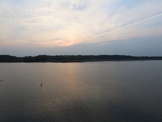 Fototapeta premium sunset over the river