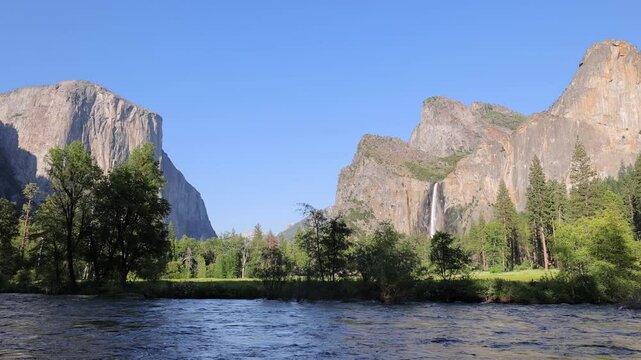 The Merced River as it runs through Yosemite National Park in California. El Capitan and Bridalveil Fall in the background. This video Loops seamlessly.