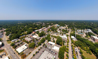 Daytime Drone Images of Downtown Wake Forest North Carolina on a Sunny Day, Featuring the Historic District, The Seminary, The Fire Department, and New Residential Construction