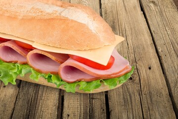 Tasty fresh big sandwich with ham, and vegetables