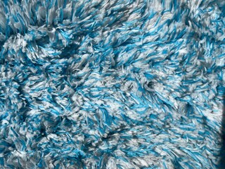 Blue and white long pile carpet