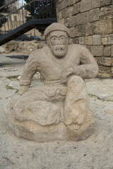 Azerbaijan, Baku . 01.01.2000 . An ancient statue made of stone. Maiden Tower Baku Stock Photos .
