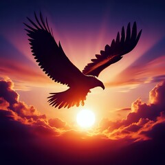 Obraz premium Eagle silhouette flying against a sunset sky