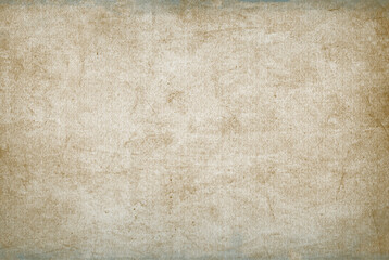 Vintage paper texture. Old worn damaged shabby parchment sheet. Grunge background