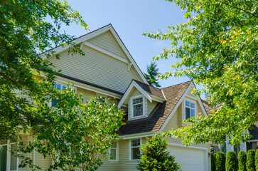 Houses in suburb at Summer in the north America. Luxury houses with nice landscape.
