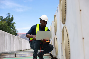  Technician check and maintenance service Air conditioners and air compressor  on the rooftop