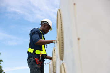  Technician check and maintenance service Air conditioners and air compressor  on the rooftop