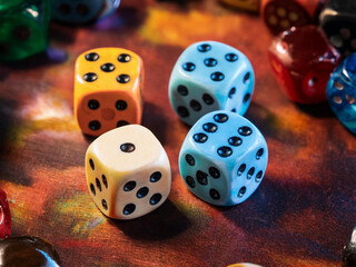 dice on a wooden surface, gambling.