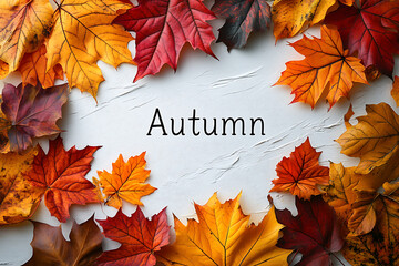 autumn leaves frame the word "Autumn" 