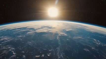 Obraz premium A breathtaking view of Earth from space, with the sun rising over the horizon.
