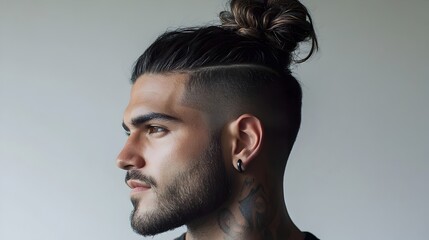 Stylish Man with Fashionable Undercut Hairstyle and Man Bun