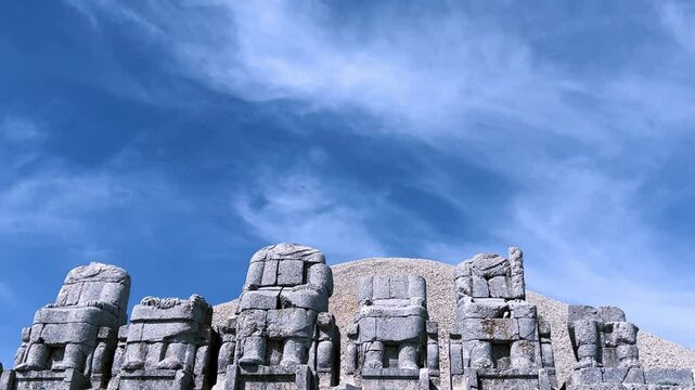 Turkey, Adiyaman, May 3, 2024: ruins at the top of Mount Nemrut. Destroyed ancient statues in the Taurus Mountains. Ancient stone heads on top of Mount Nemrut. 4К