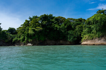 Stunning Tropical Island in Bocas del Toro, Panama with Crystal Clear Caribbean Waters, Lush Green Forest, and Vibrant Coastal Scenery, A Paradise for Nature Lovers and Eco-Tourism Enthusiasts