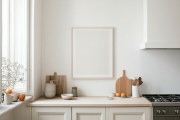 A simple vertical frame sits on a kitchen wall in a Paris apartment, featuring a blank white poster. The kitchen is styled with natural elements and minimal decor