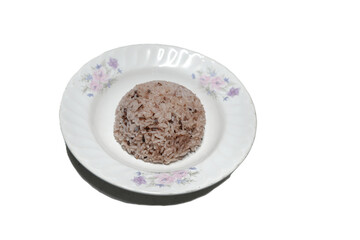 Cooked ryeberry rice in a white plate