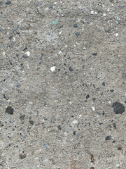 texture of gray granite surface with black spots and small gray spots
