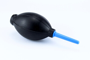 manual hand pump air blower or rubber dust blower isolated on white background. Camera and Lens...