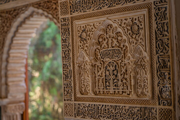 Detailed view of the architecture in Nasrid Palace, Alhambra, Granada.
