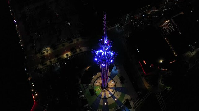 Aerial night video of The  Orlando StarFlyer is &ldquo;The World's Tallest Stand-Alone Swing Ride&rdquo; standing at 450 feet.