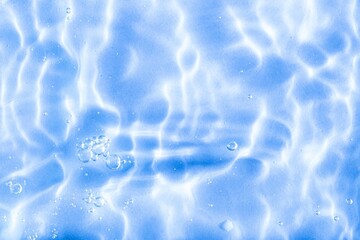 Blue water with soft ripples on the surface.