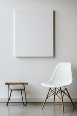 Minimalist interior design with a white chair and small wooden table against a plain background. Perfect for modern home and office decor inspiration.