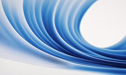 Blue fabric curves in a spiral shape against a white background