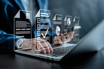 Businesswoman manage e-document system Online .Document management checking the version correct and...