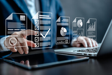 Businesswoman manage e-document system Online .Document management checking the version correct and...