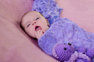 Newborn baby girl in photo shoot